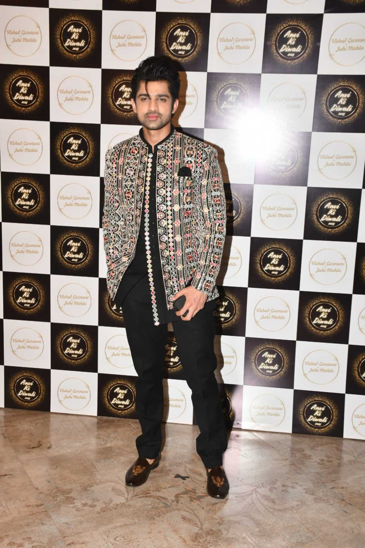 Abhishek Kumar made a dapper appearance at the Diwali bash in an intricately embroidered black bandhgala jacket. He paired it with matching black trousers and kurta.